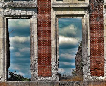 Low angle view of old building against sky