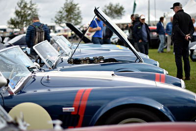 Cars parked on field