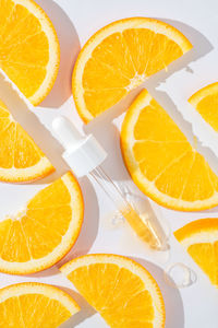 Directly above shot of sliced oranges on table