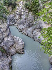 High angle view of river amidst rocks