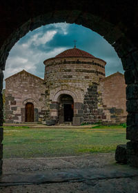 Old building against cloudy sky