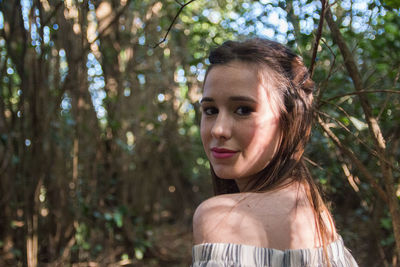 Portrait of woman in forest