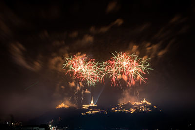 Firework display at night