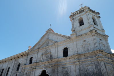 Low angle view of historic building against clear sky