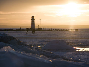 Scenic view of sea at sunset