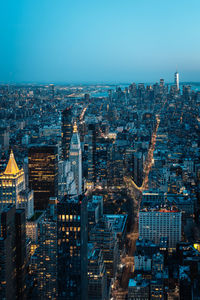 Aerial view of cityscape against sky