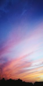 Low angle view of dramatic sky during sunset