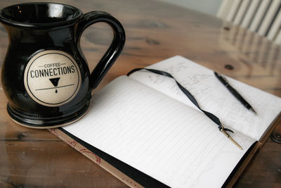 High angle view of open book on table