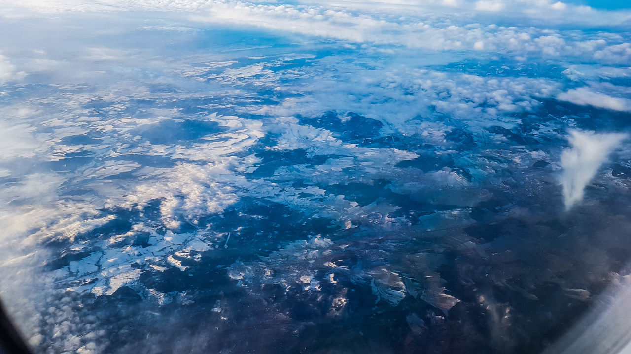 AERIAL VIEW OF SEA FROM AIRPLANE