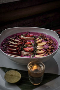 Close-up of food with tea on table