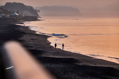 Scenic view of sea against sky during sunrise