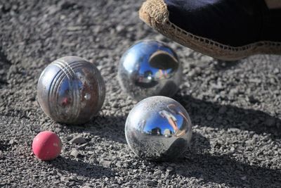 Close-up of balls on sand