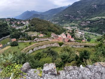 High angle view of trees and buildings against sky