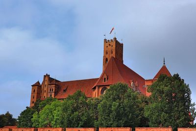 Low angle view of traditional building against sky