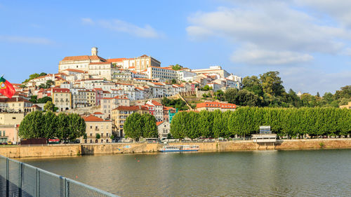 River against buildings in city