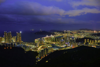 Illuminated buildings in city at night