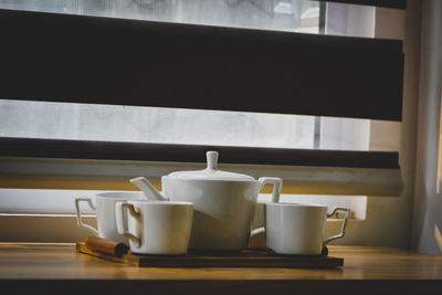 Close-up of coffee cup on table