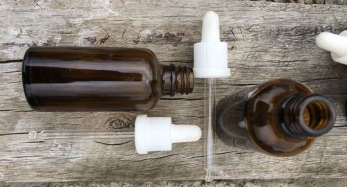 High angle view of bottles on table