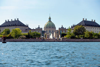 View of buildings against sky in city