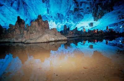 Reflection of rocks in water