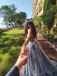 Walking with wedding dress