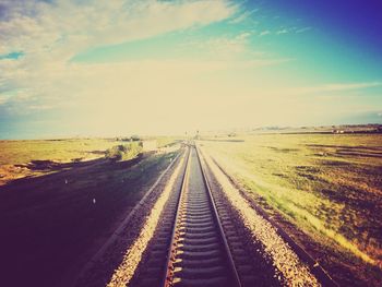 Road passing through field