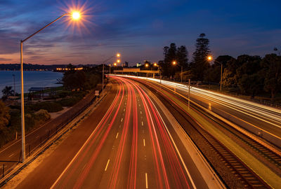 High angle view of light trails on street at night