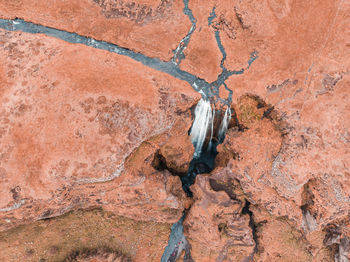 High angle view of rock on land