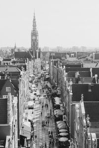 High angle view of city buildings against clear sky