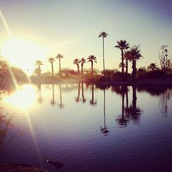 Scenic view of sunset over river