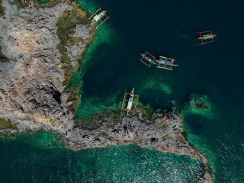 Aerial view of ships moored at sea