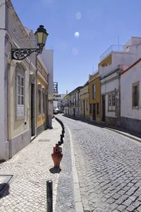 Street amidst buildings in city