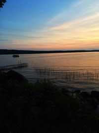 Scenic view of sea at sunset