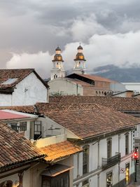 High angle view of building against cloudy sky in cuenca ecuador 