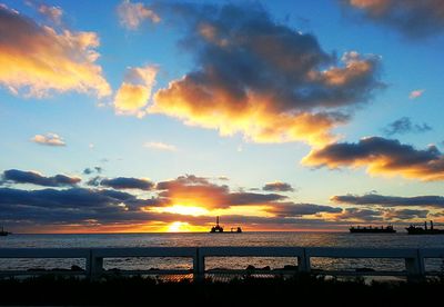 Scenic view of sea at sunset