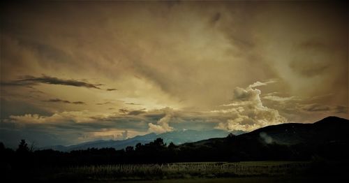 Scenic view of silhouette landscape against sky during sunset