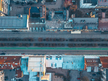 Directly above shot of road amidst buildings in city