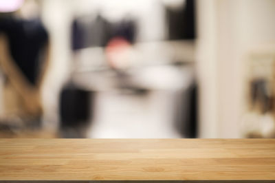 Defocused image of people on hardwood floor