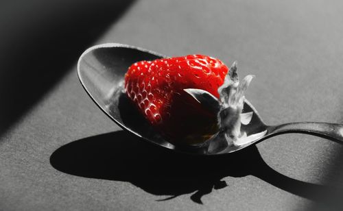 High angle view of strawberry on table