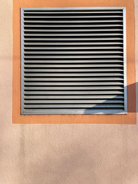 Closed shutter window of building