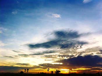 Scenic view of landscape at sunset