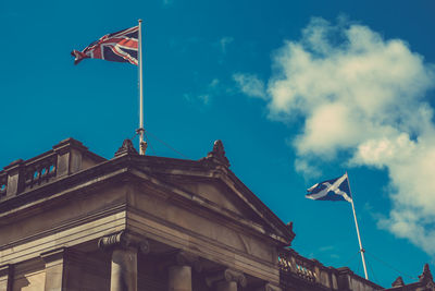 Low angle view of built structure against blue sky