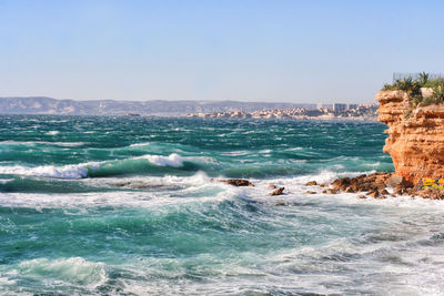 Scenic view of sea against clear sky