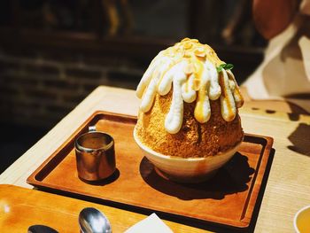 Close-up of dessert served on table in restaurant