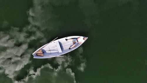 High angle view of boat moored in water