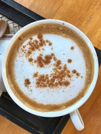 High angle view of cappuccino on table