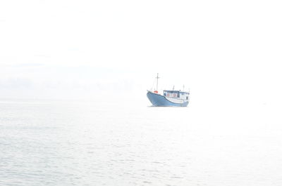 Scenic view of boats in sea