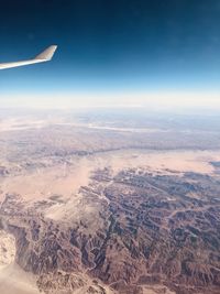 Aerial view of dramatic landscape against sky