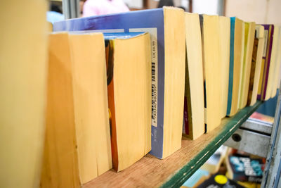 New delhi, india, september 09 2023 - variety of books on shelf inside a book-stall at delhi, india