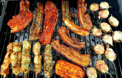 Close-up of meat on barbecue grill